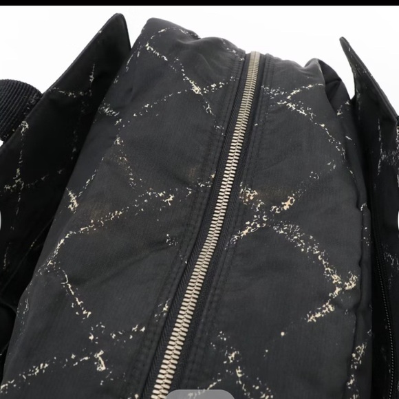 CHANEL Black Quilted Travel Bag with Diamond Pattern - Picture 9 of 16